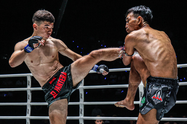 Uzbek fighter Aslamjon Ortikov lands a kick on Yodthongthai Sor Sommai at ONE Friday Fights 78