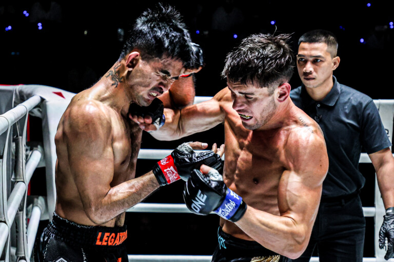 Muay Thai fighters Rungrawee Sitsongpeenong and George Jarvis trade blows