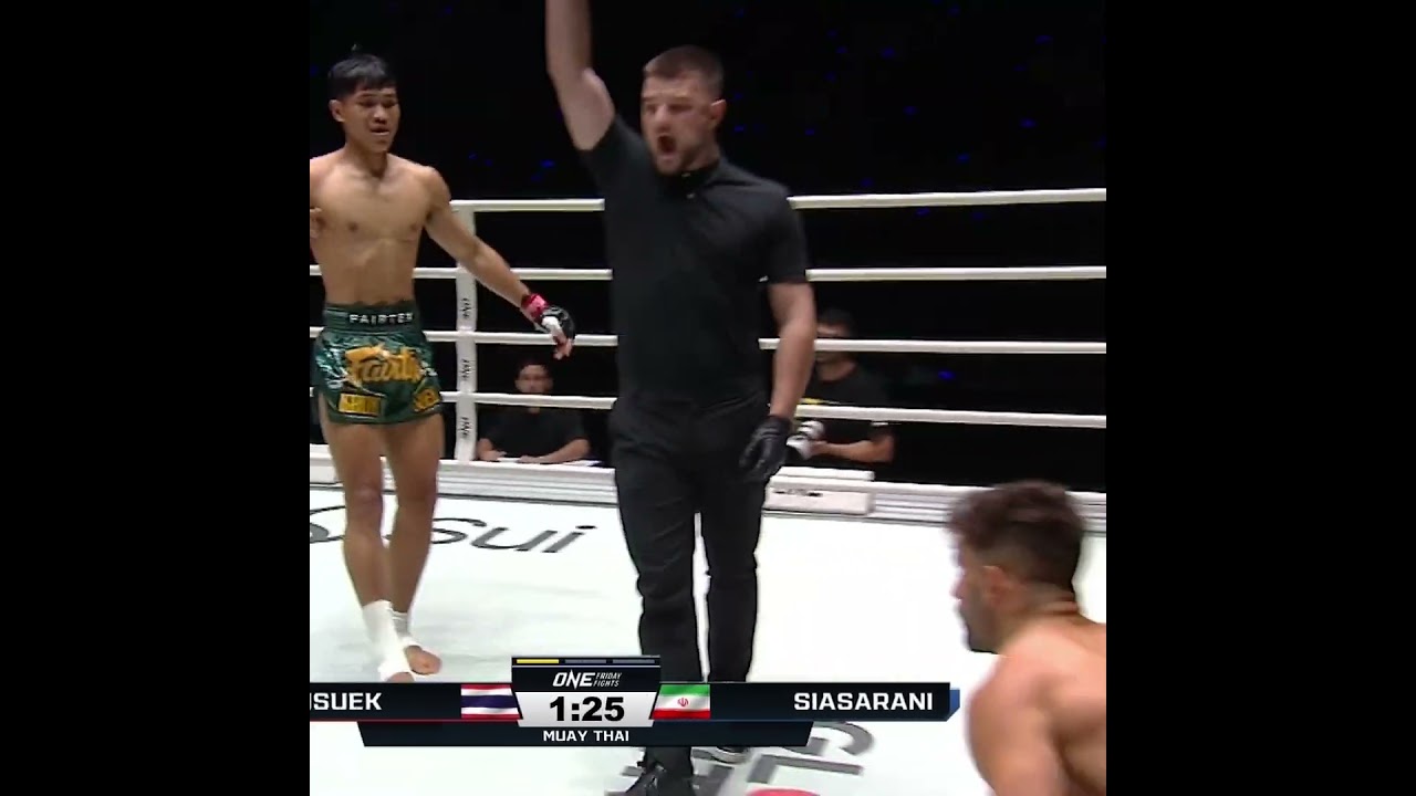 SIT DOWN  Khunsuek drops Mohammad Siasarani with a head kick en route to a unanimous decision win!