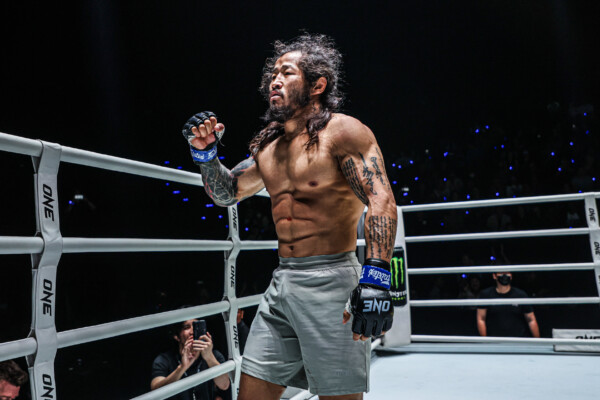 MMA fighter Enkh-Orgil Baatarkhuu celebrates his win in the ring