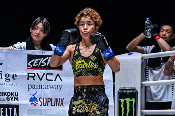 Kana Morimoto stands in the ring