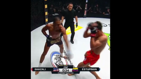 EYE FOR AN EYE  Johan Ghazali and Johan Estupinan trade knockdowns in the first two rounds!
