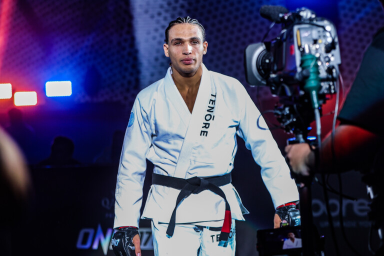 Kade Ruotolo enters the ring wearing his gi