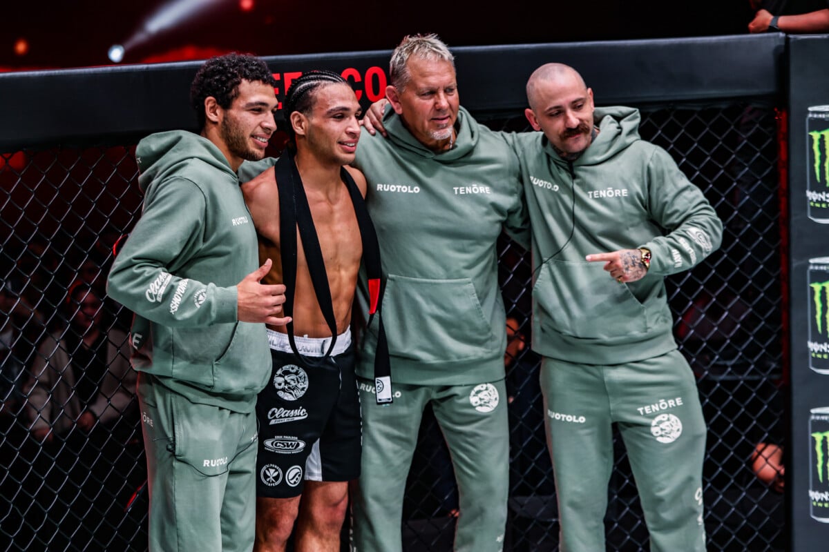 Kade Ruotolo, alongside his team, poses for the camera after overcoming Nicolas Vigna ONE 171.