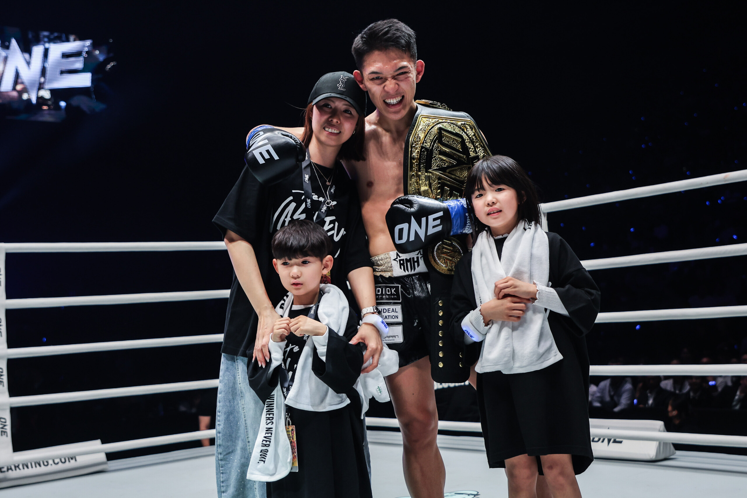 Masaaki Noiri celebrates with his family following his victory at ONE 172.