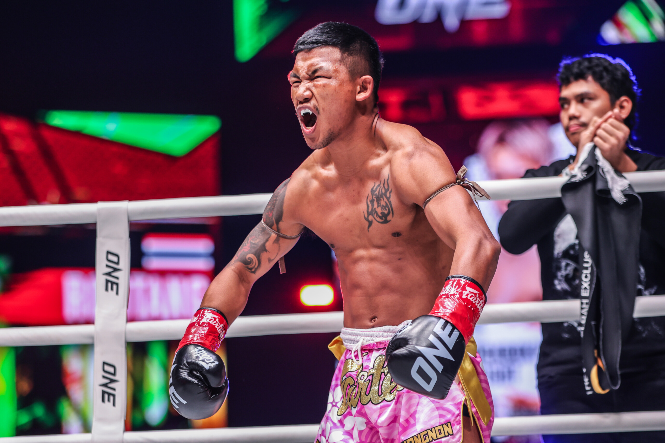 Rodtang Jitmuangnon flexes in the ring