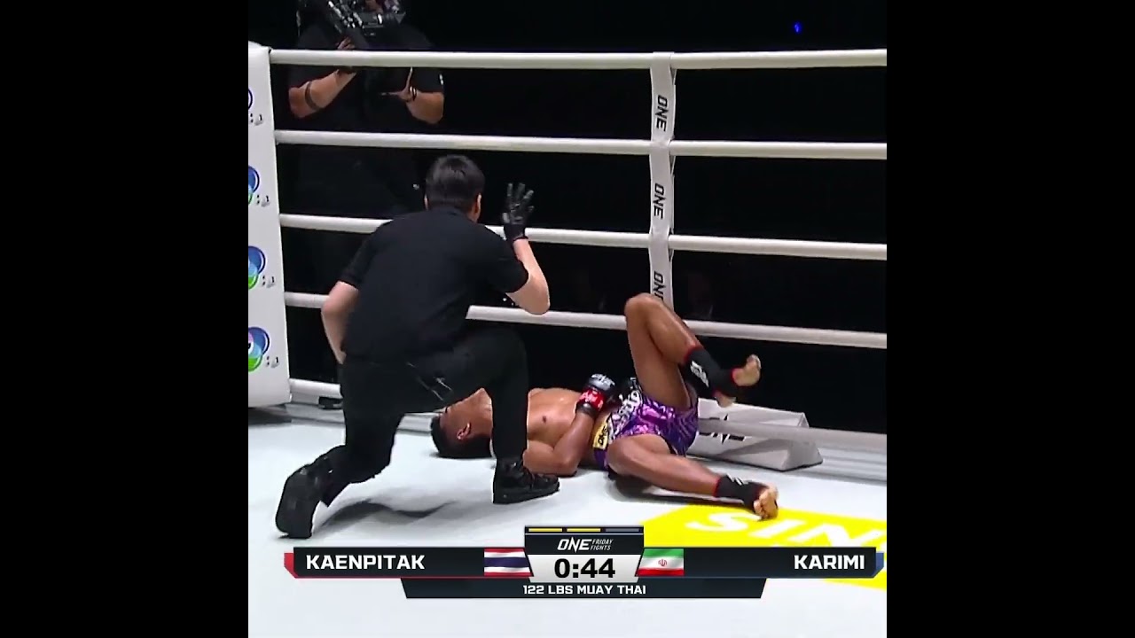 GUT CHECK  Majid Karimi scores the win against Kaenpitak with a nasty body shot KO!