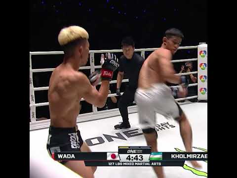 Avazbek Kholmirzaev sends Tatsumitsu Wada OUT OF THE RING with a front kick and follow up strikes!