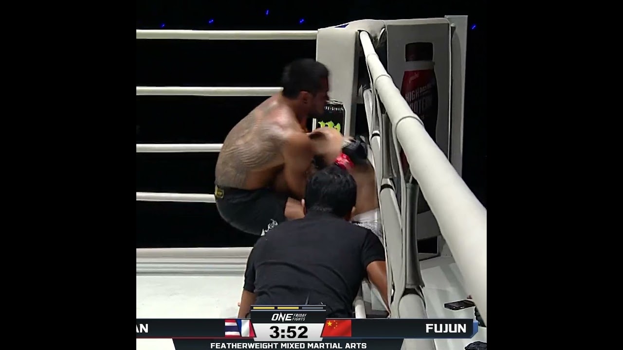 LOCKED IN  Alexandre Khan cinches a second round anaconda choke against Cao Fujun!
