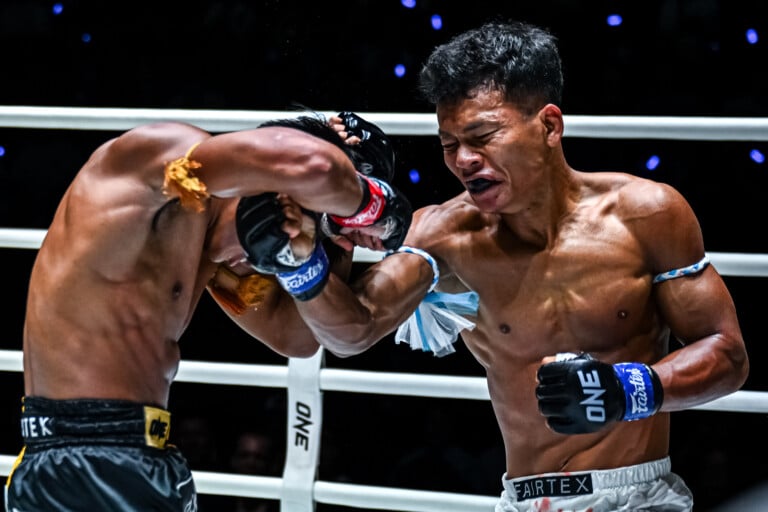 Numsurin Chor Ketwina uppercuts Songchainoi Kiatsongrit at ONE Friday Fights 122.