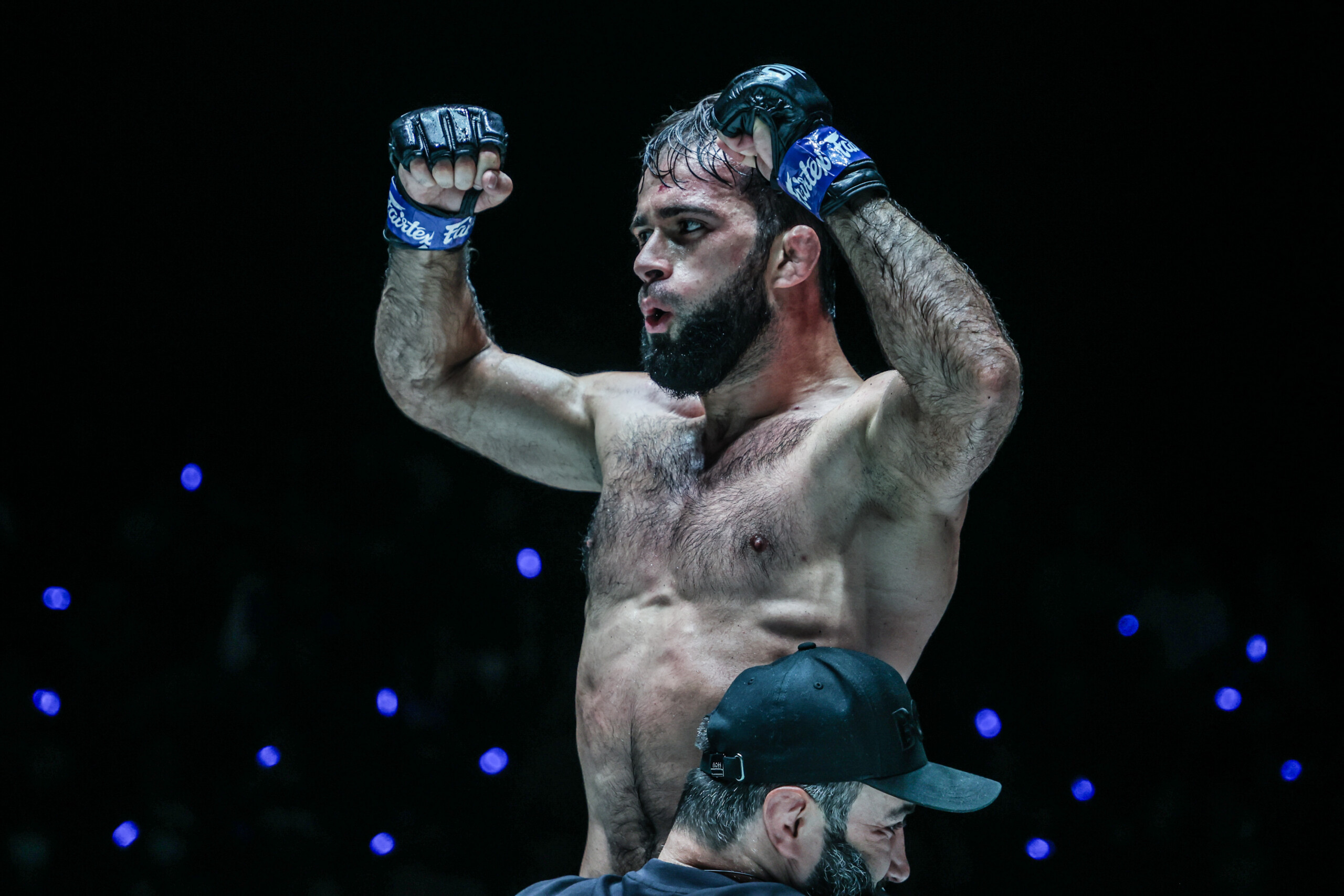 Dagestani MMA fighter Shamil Gasanov raises his arms