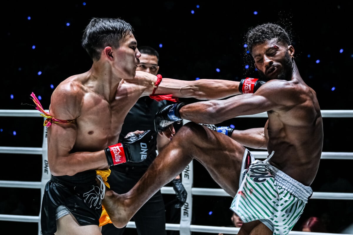 Muay Thai fighter Khunpon Aekmuangnon punches Edilson Rodrigues