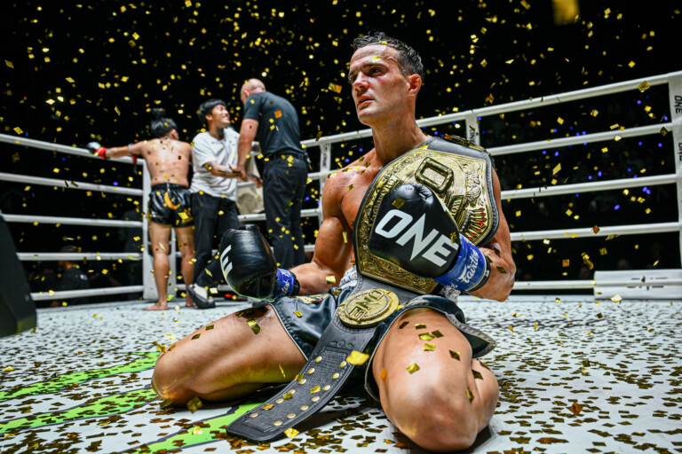 Jonathan Di Bella basks in glory after unifying the strawweight kickboxing belts agianst rival Prajanchai PK Saenchai at ONE Fight Night 36