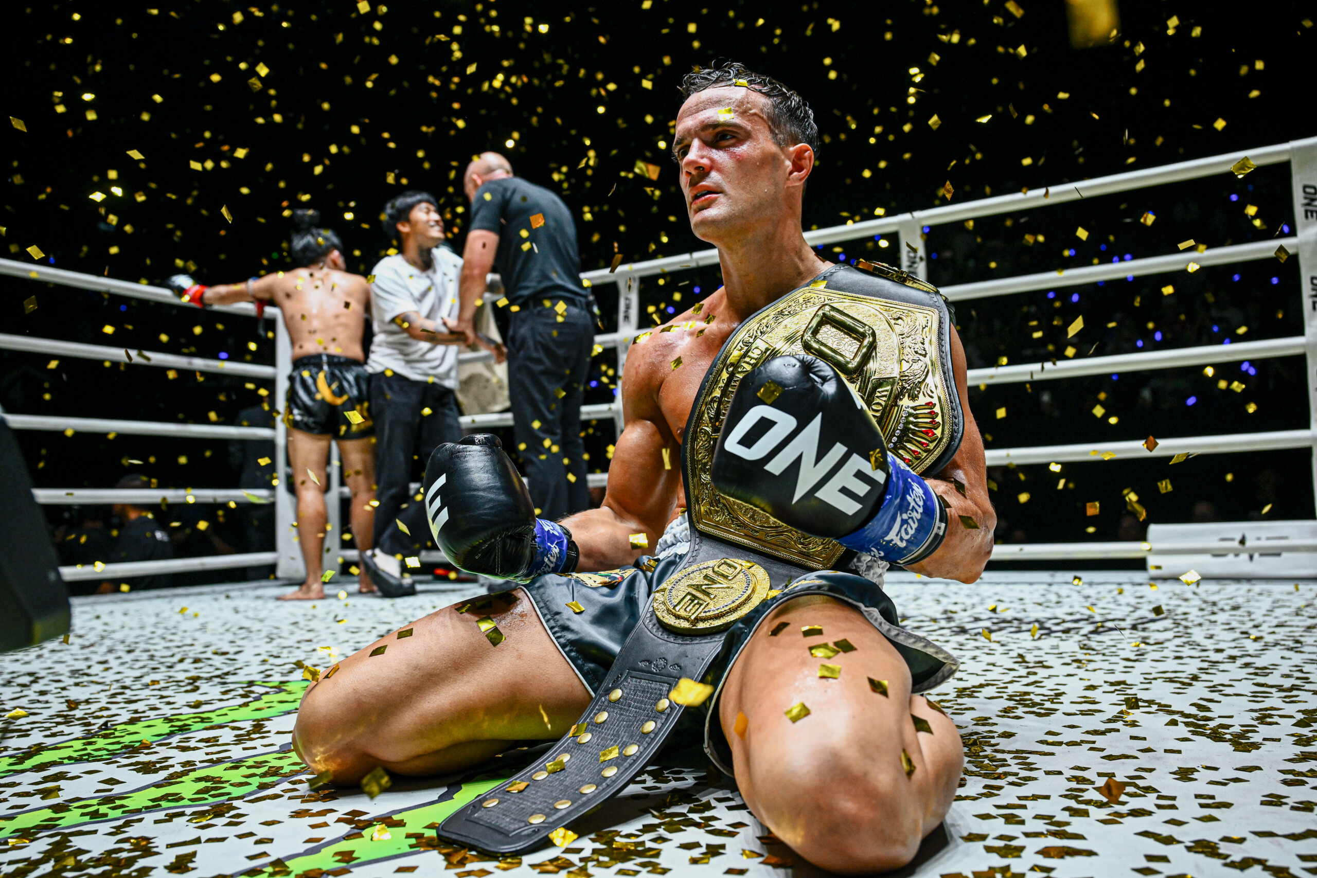 Jonathan Di Bella basks in glory after unifying the strawweight kickboxing belts agianst rival Prajanchai PK Saenchai at ONE Fight Night 36