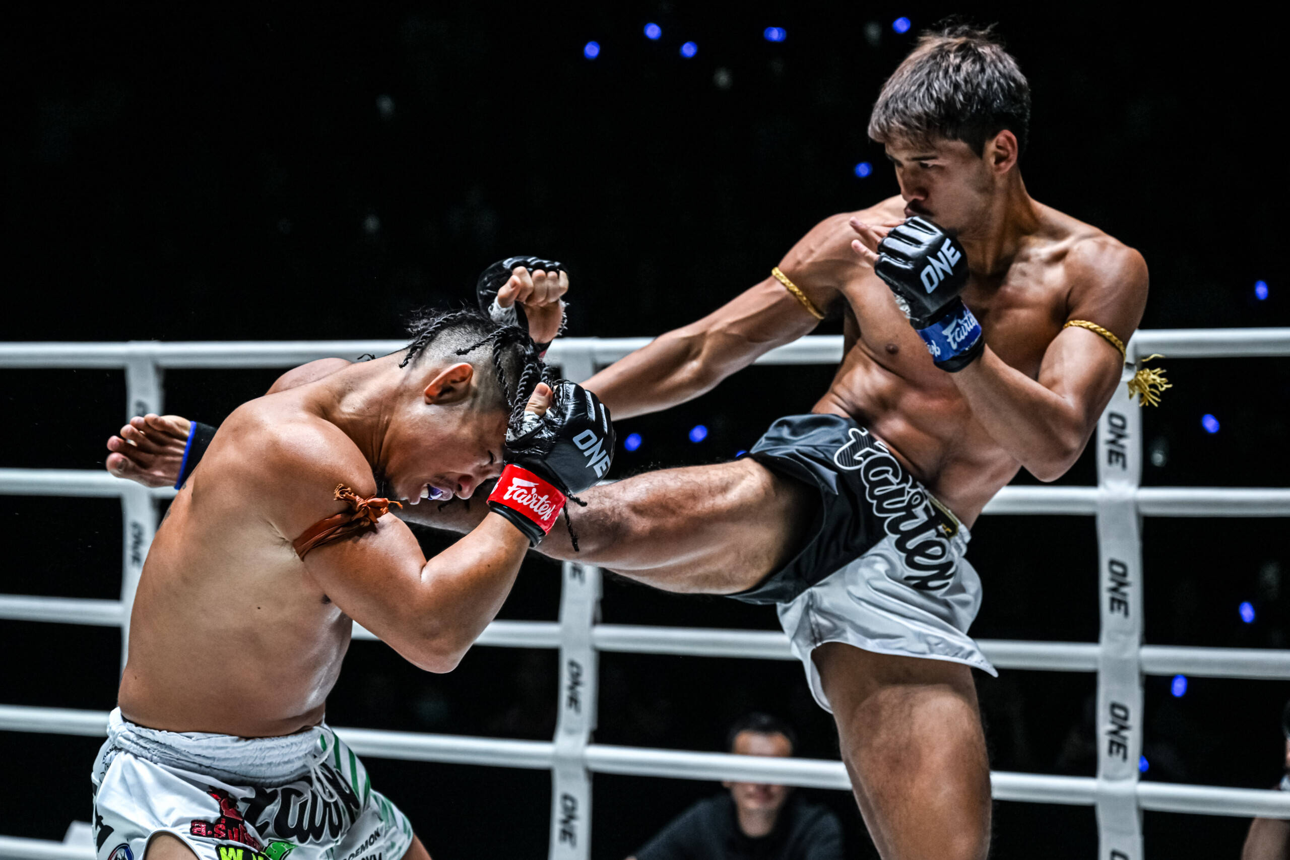Thai star Decho Por Borirak lands a head kick on Suriyanlek Por Yenying at ONE Friday Fights 131