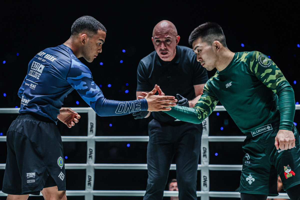 Diogo "Baby Shark" Reis shakes hands with Daiki Yonekura in the ring