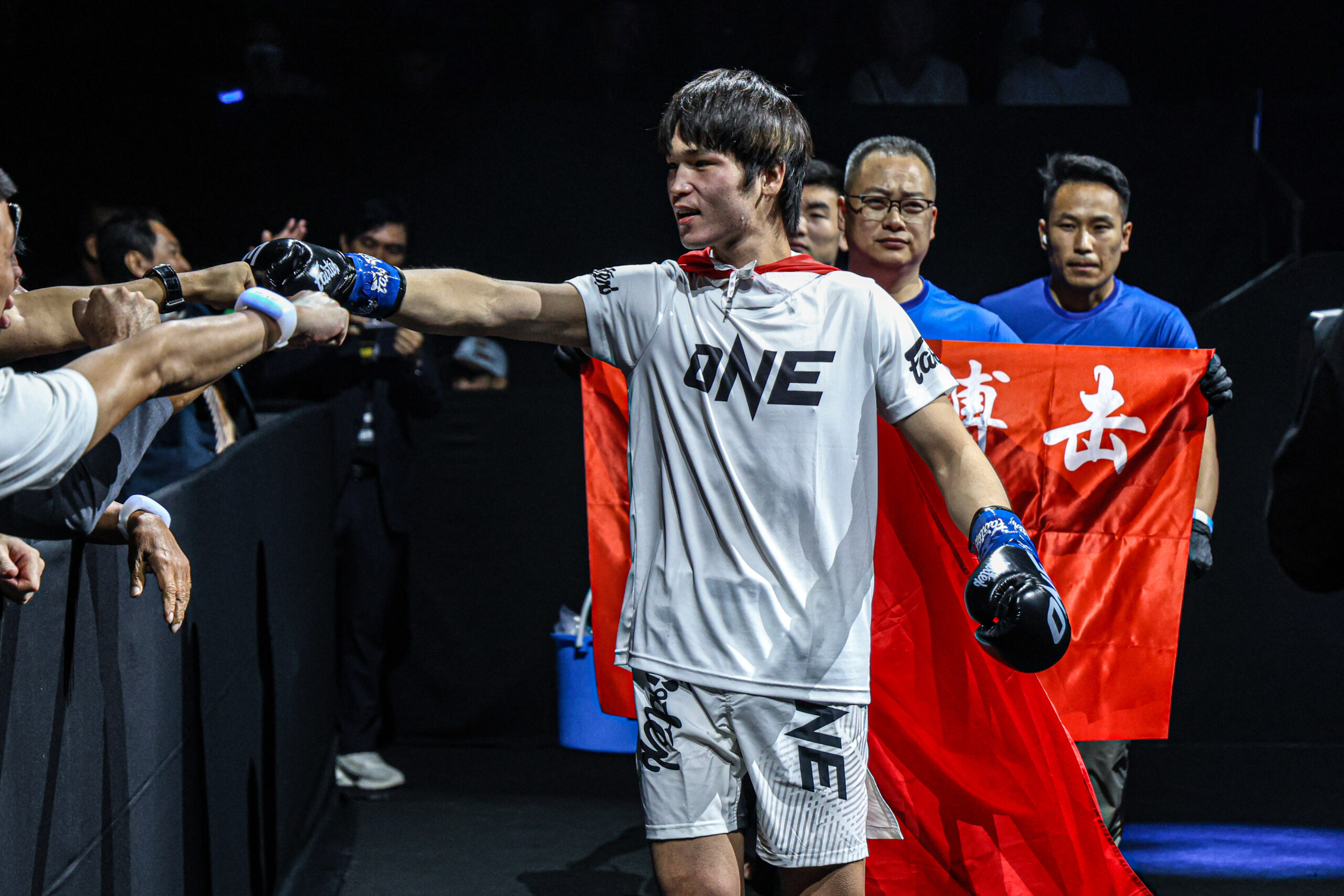 Chinese kickboxer Liu Mengyang walks to the ring