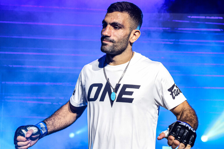 Iranian fighter Mohammad Siasarani makes his entrance