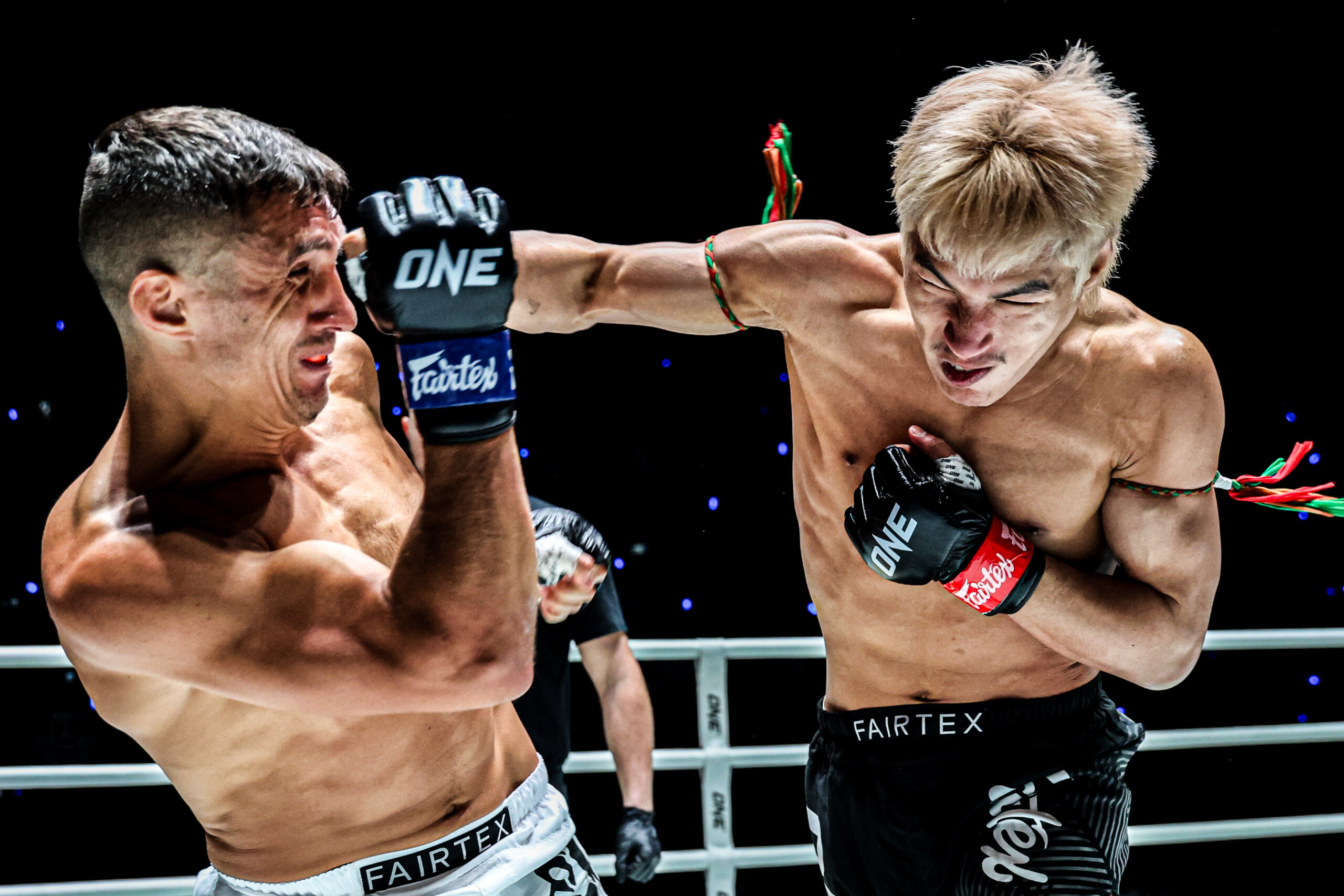 Muay thai fighter Yod-IQ Or Pimolsri punches Alexey Balyko