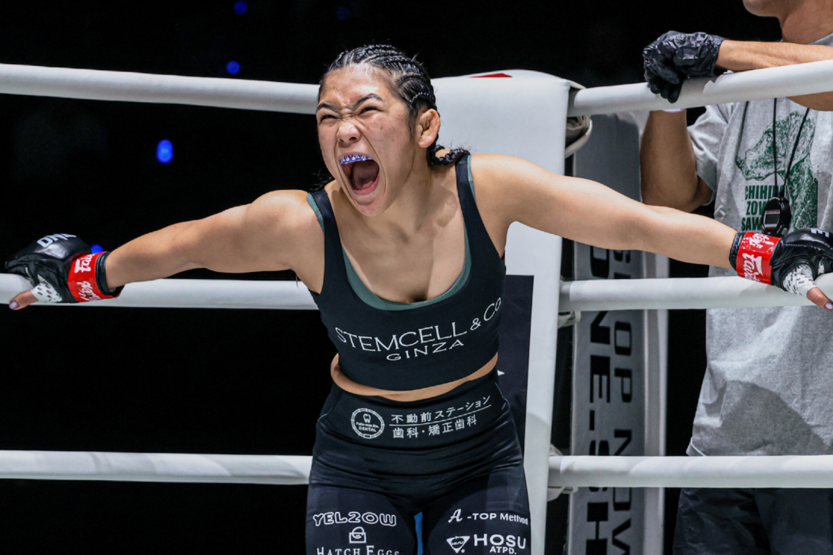 MMA fighter Chihiro Sawada screams in the ring corner before battle