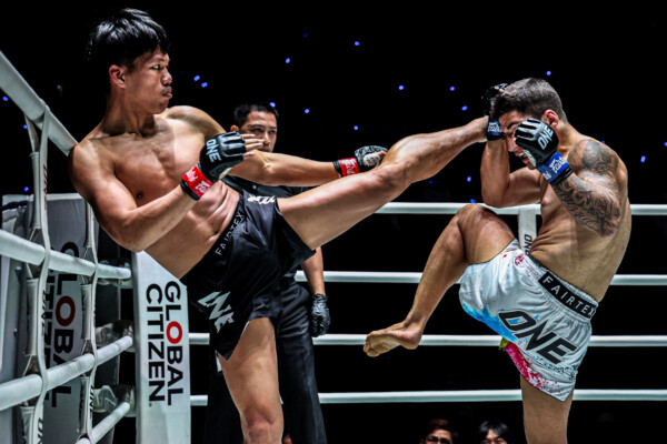 Kongklai Sor Sommai lands a head kick on Mohammad Habibpour