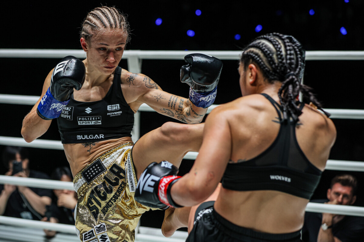 Stella Hemetsberger lands a push kick on Jackie Buntan