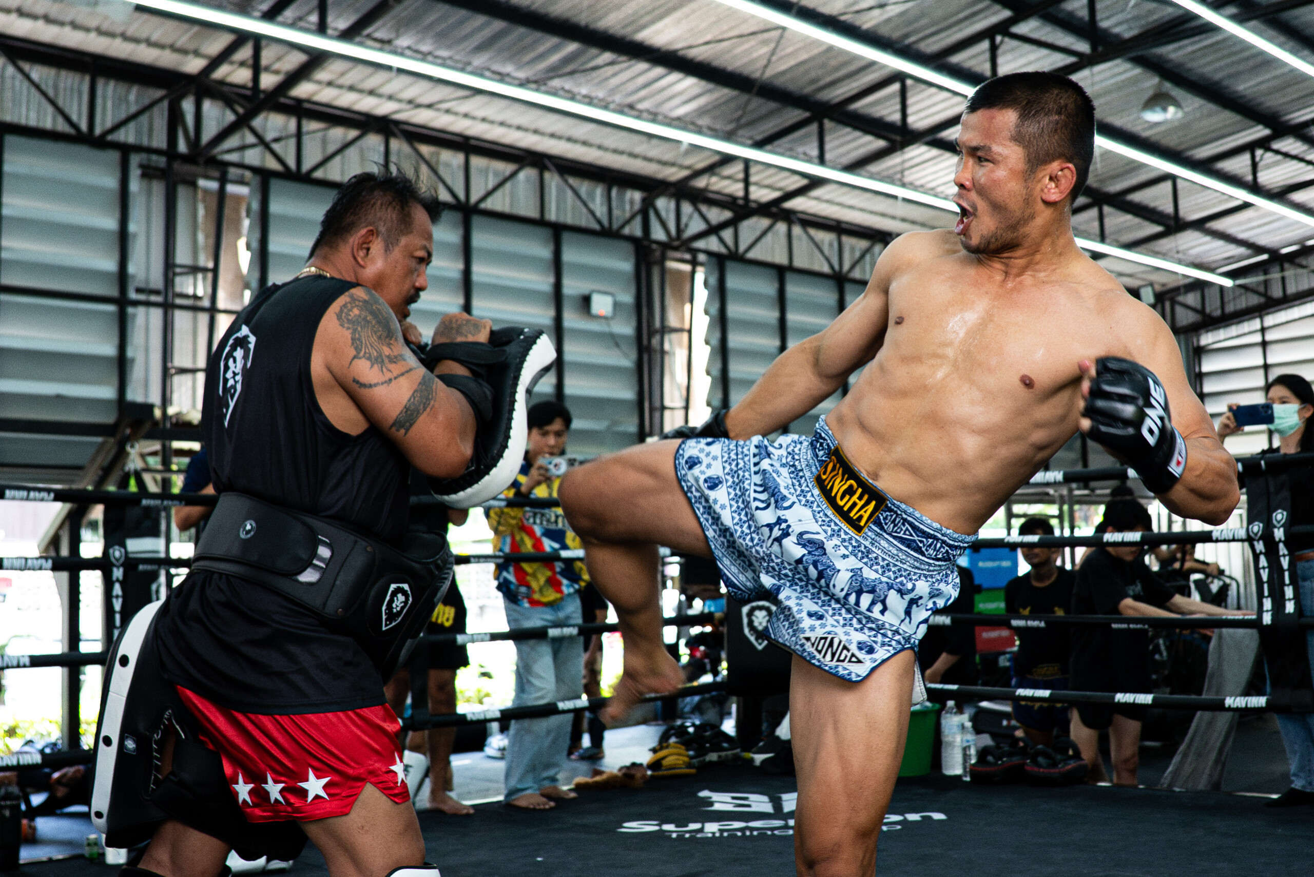 Muay Thai legend Nong O Hama kicks Thai pads ahead at an open workout ahead of ONE Friday Fights 147