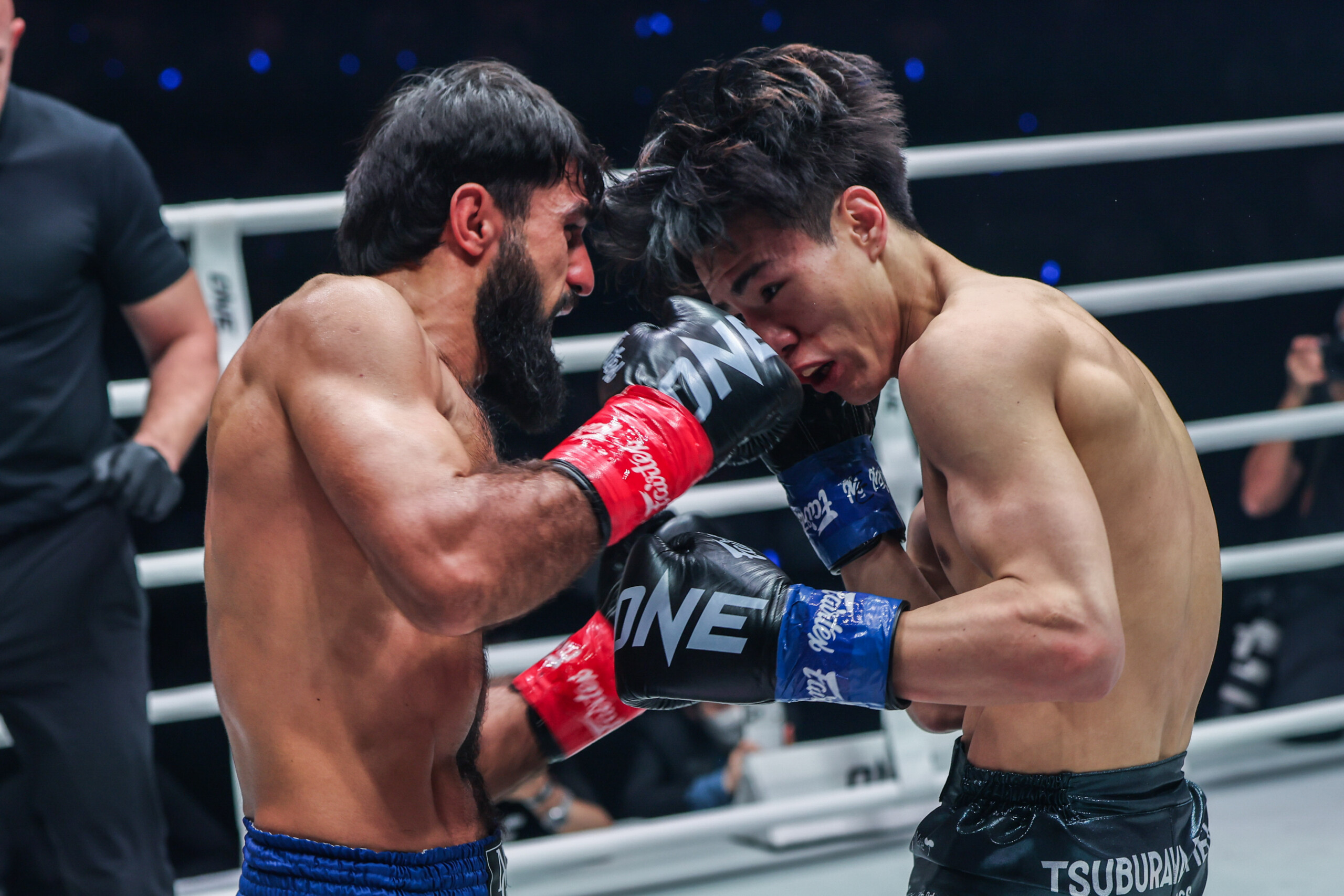 Kickboxing star Marat Girigorian lands a cross on Kaito Ono