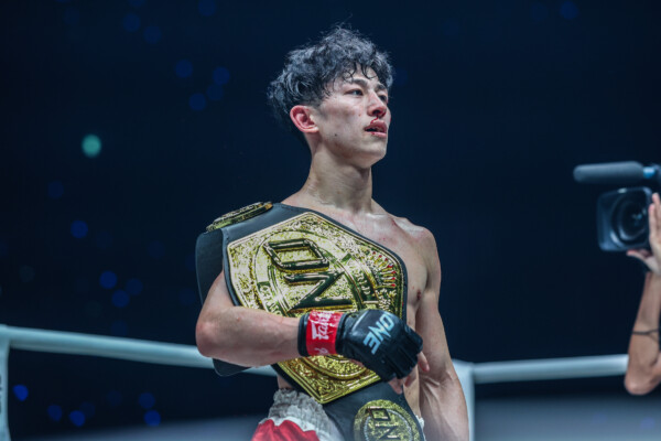 Nadaka proudly carries the ONE Atomweight Muay Thai belt after his five-round war with Songchainoi