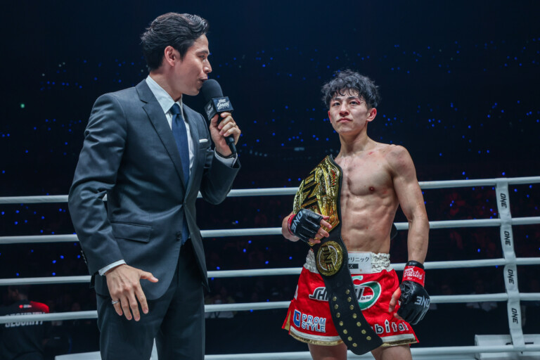 Nadaka proudly carries the ONE Atomweight Muay Thai belt after his five-round war with Songchainoi.
