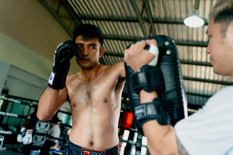 Rungrawee Sitsongpeenong punches a pad at his open workout
