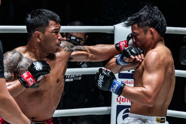 Samingdam NF Looksuan slams a stinging left on Yodphupa Petkiatpet at ONE Friday Fights 154