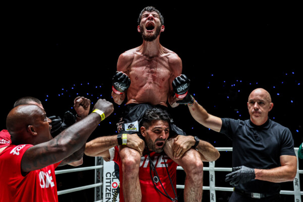 Asadula Imangazaliev celebrates with his team after beating Aslamjon Ortikov atThe Inner Circle 20