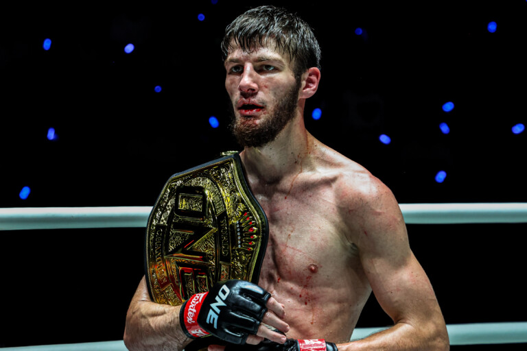 Asadula Imangazaliev celebrates his title win over Aslamjon Ortikov