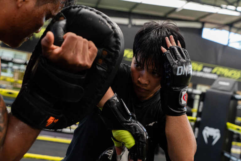 Phetjeeja hits pads during her Open Workout for The Inner Circle 19