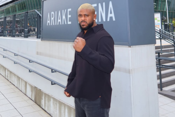 Regan Upshaw poses outside Tokyo's Ariake Arena during his visit to Japan in November 2025.