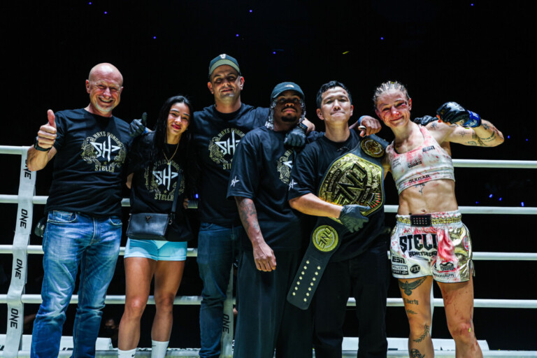 Allycia Hellen Rodrigues (second from left) celebrates Stella Hemetsberger's World Title win against Jackie Buntan at ONE Fight Night 35.