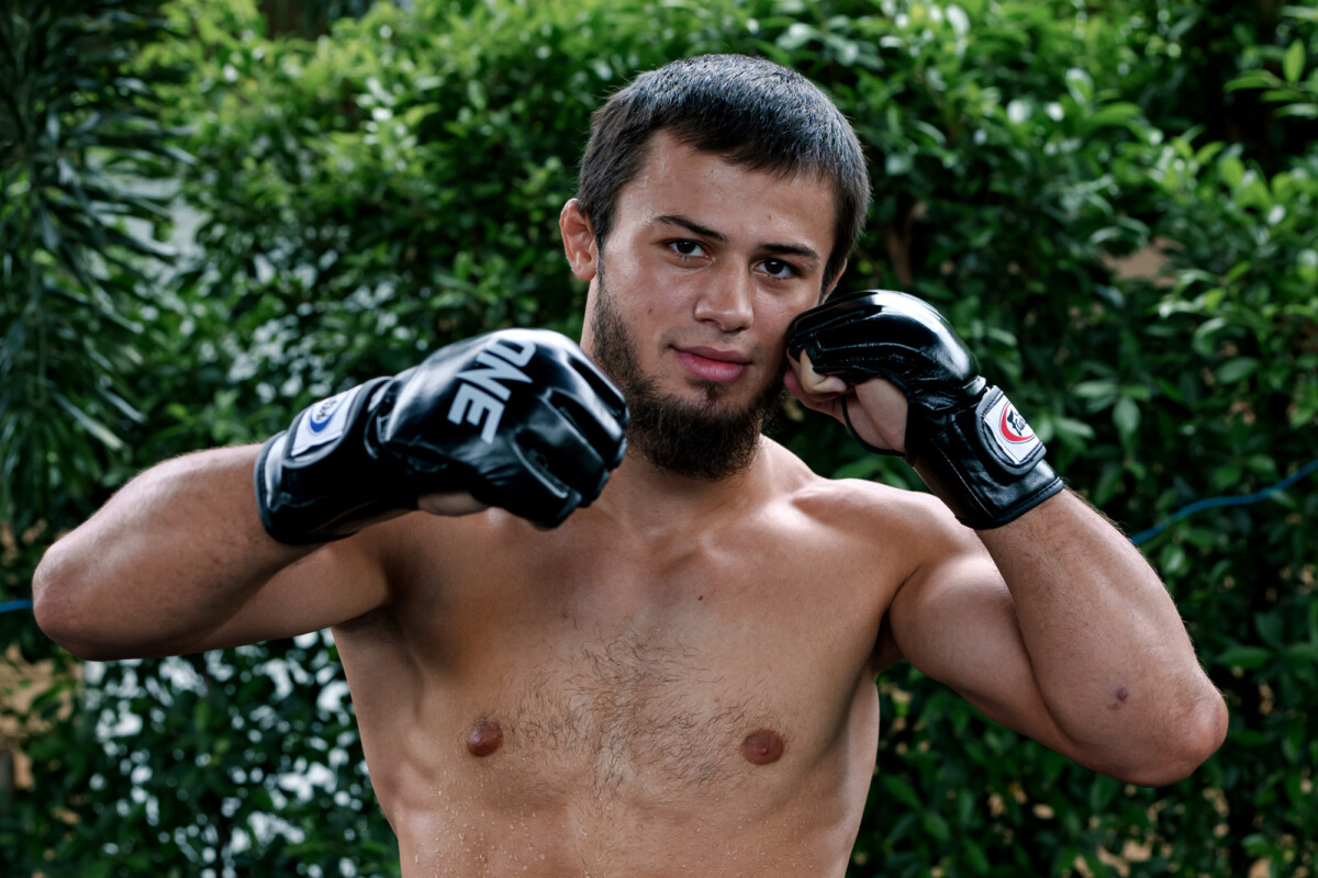 Abdulla Dayakaev strikes a pose for media at The Inner Circle 25 Open Workout