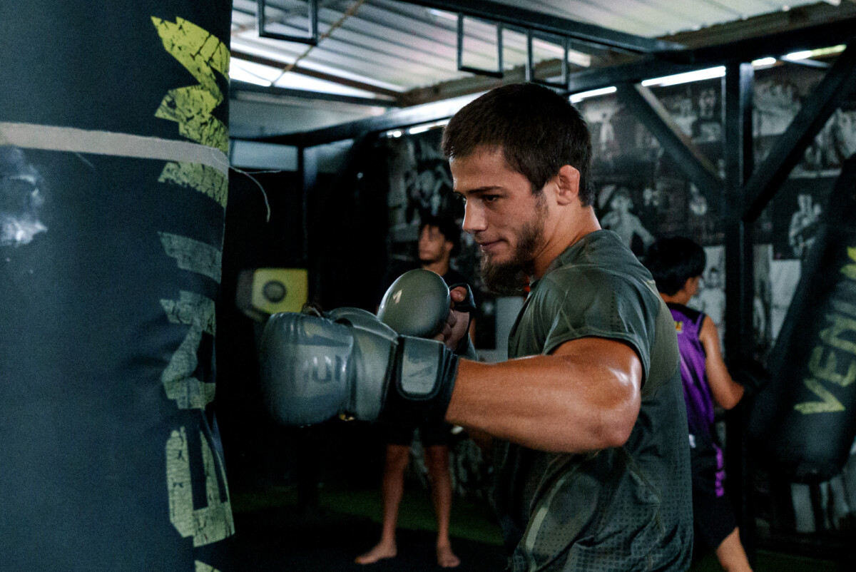 Abdulla Dayakaev throws a punch on heavy bag at The Inner Circle 25 Open Workout