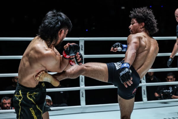 Brazilian MMA fighter Antonio Cesar kicks Lito Adiwang