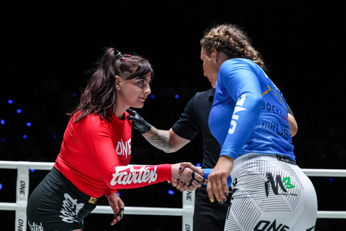 Helena Crevar and Paige Ivette Clymer shake hands at The Inner Circle 22