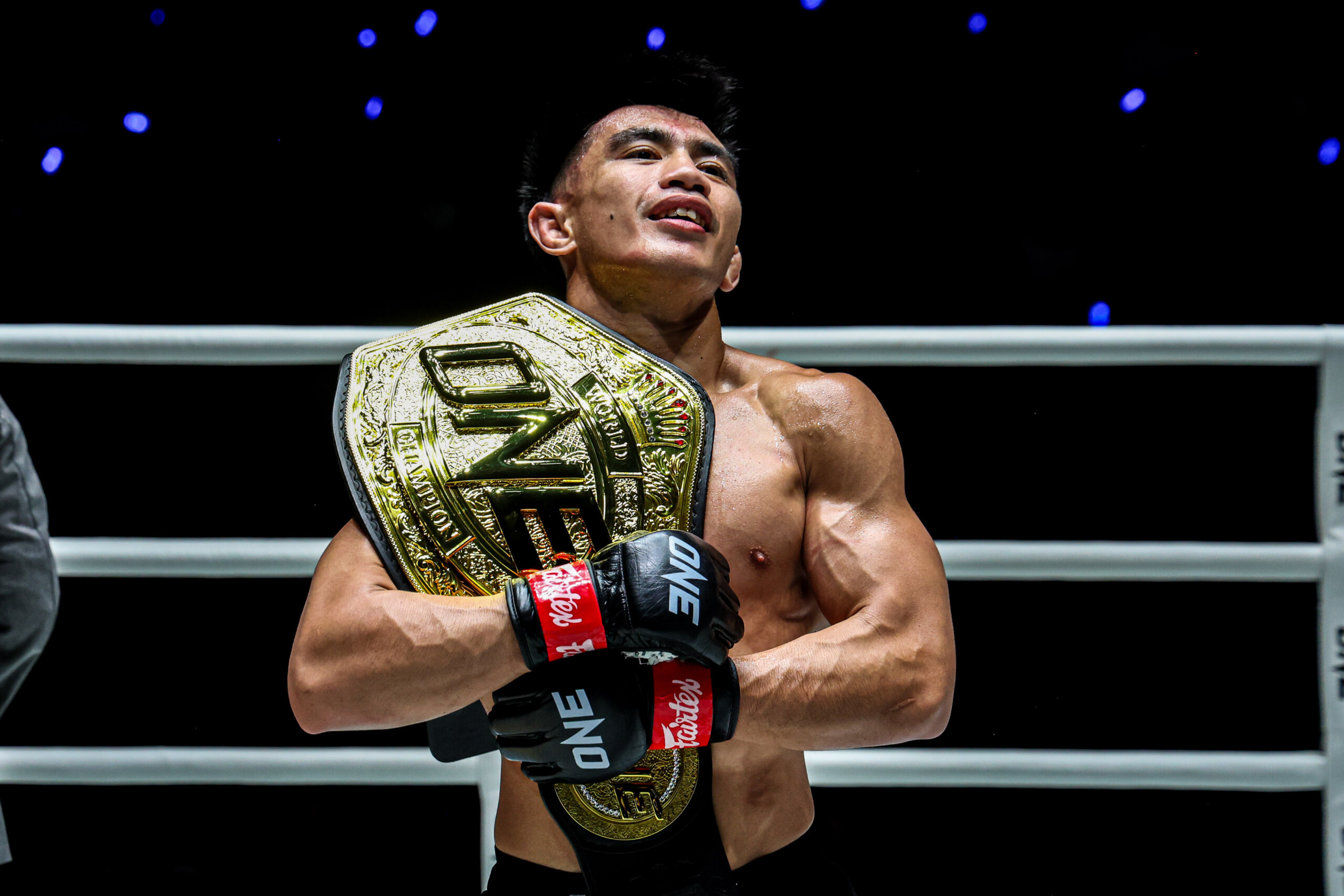 Joshua Pacio celebrates his title victory over Mansur Malachiev at The Inner Circle 21