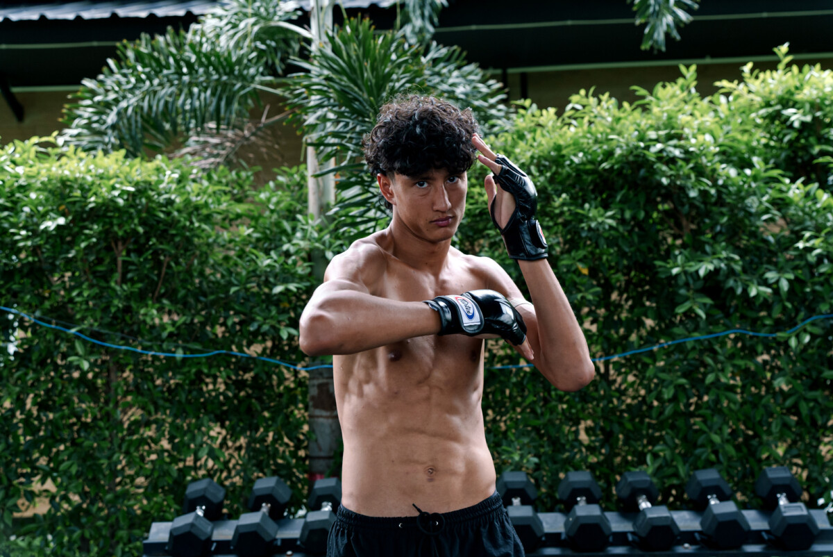 Nabil Anane strikes a pose for media at The Inner Circle 25 Open Workout