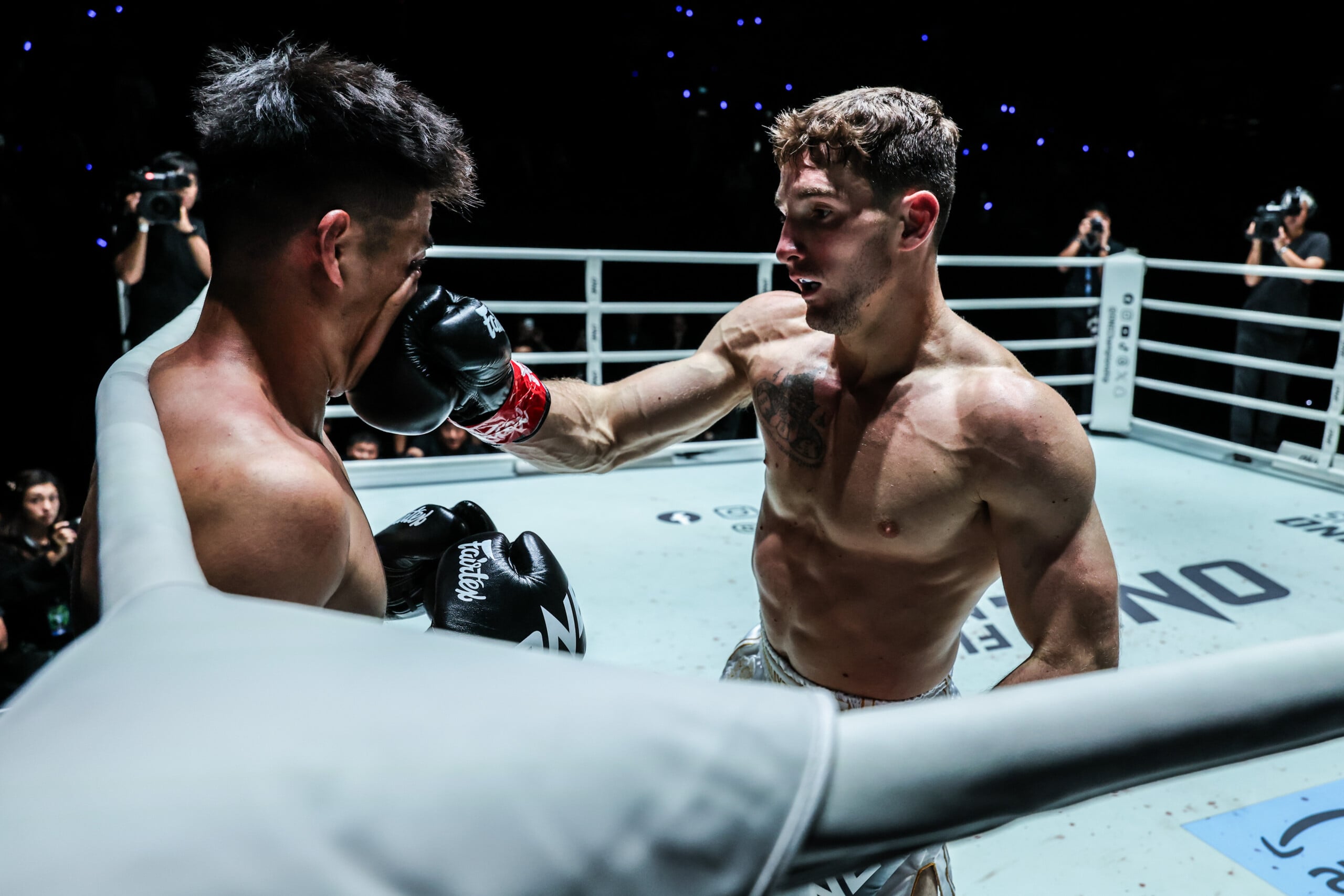Nico Carrillo cracks Chinese kickboxer Zhou Jiaqiang with a punch