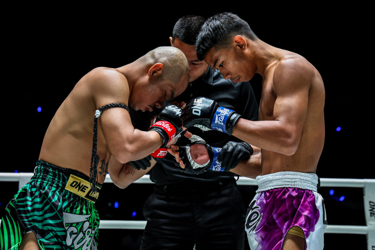 Petninmungkorn and Pet touch gloves before their clash at ONE Friday Fights 165.