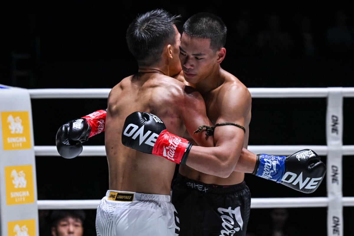 Petsiam and Wang Zhongxian embrace after their kickboxing match at The Inner Circle 31