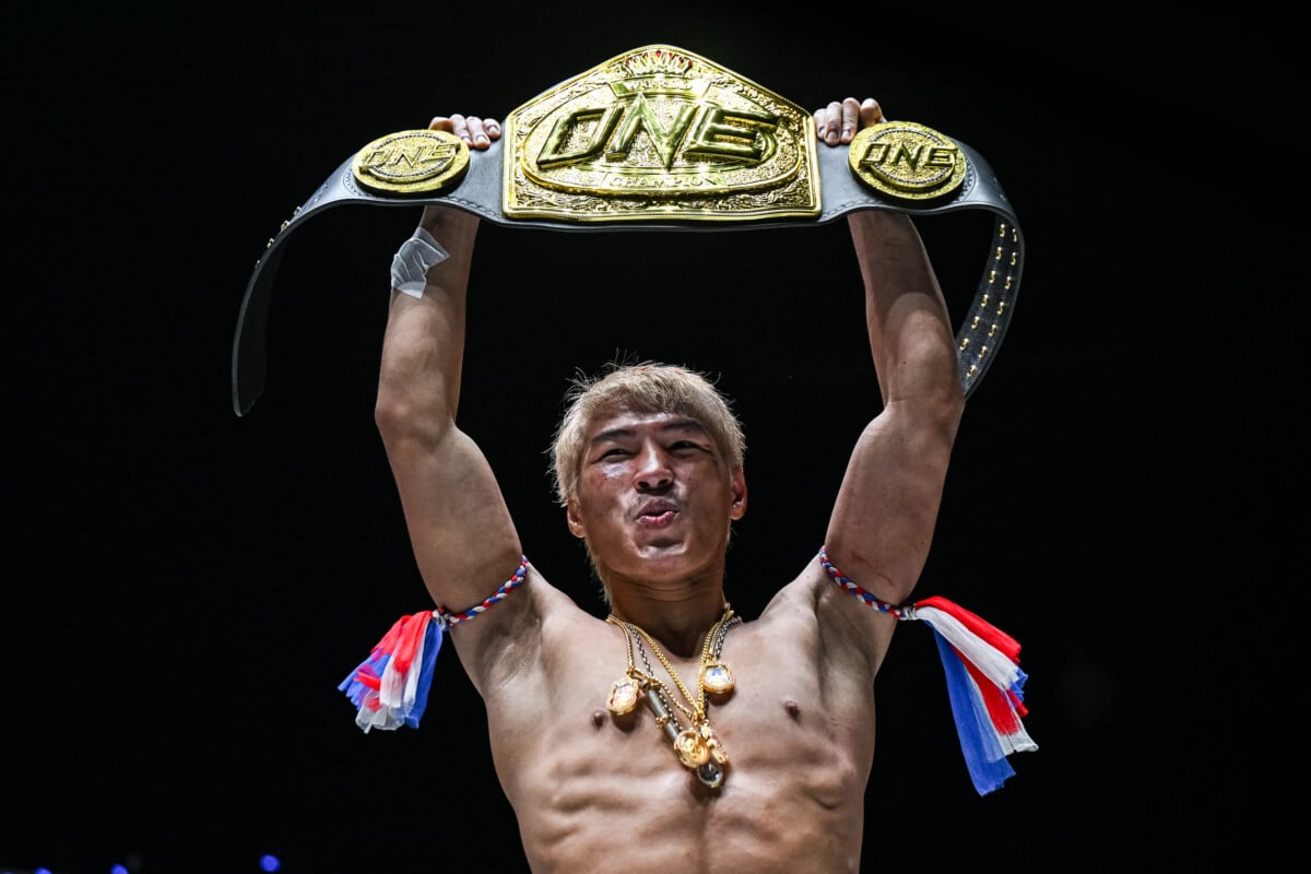 Yod IQ lifts ONE Championship belt after defeating Rambolek at The Inner Circle 30