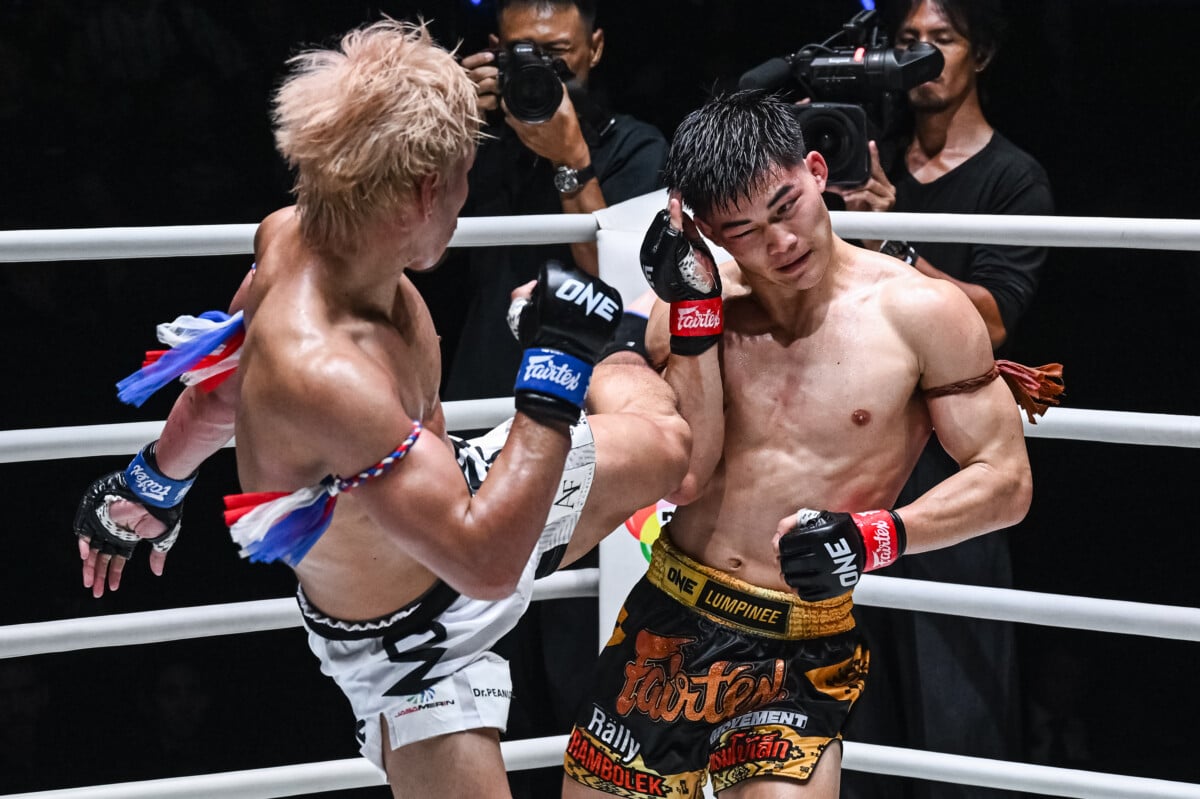Rambolek blocks a high kick from Yod IQ at The Inner Circle 30