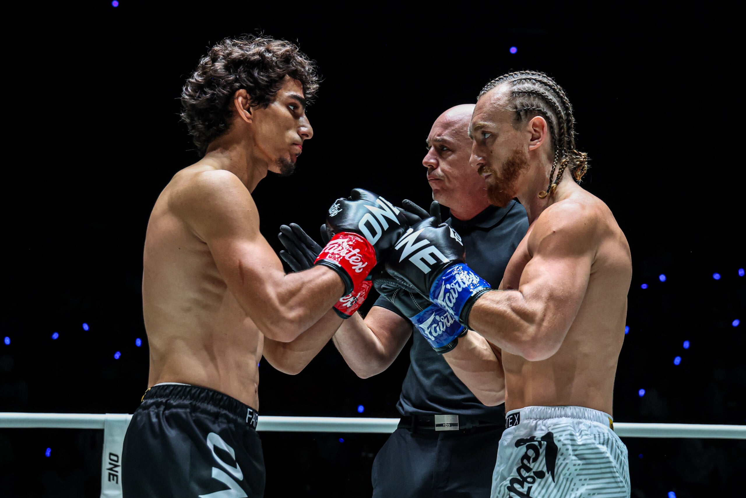 Dzhamil Osmanov touches gloves with Ben Woolliss at The Inner Circle 33.