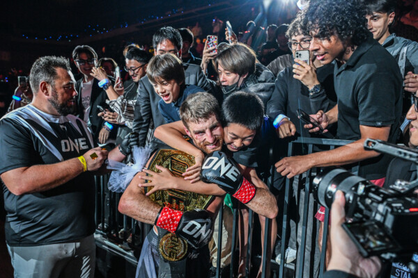 Jonathan Haggerty celebrates his World Title win over Hiroki Akimoto with the fans at ONE SAMURAI 4.